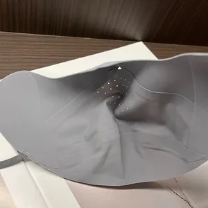 UPF 50+ ice silk sun mask in grey with breathable air holes and seamless laser-cut design
