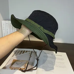 Detail view of quick-dry sun hat with adjustable chin strap and two-tone color design