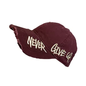 Vintage burgundy baseball cap with distressed brim and Never Give Up embroidery