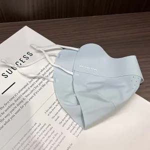 Detail of light blue ice silk sun mask featuring adjustable ear loops and fine stitching