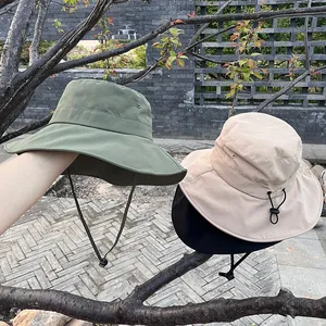 Women's wide brim sun hat with windproof drawstring for outdoor hiking and camping