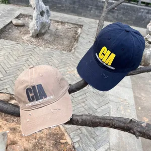 Vintage embroidered baseball caps with distressed holes in khaki and navy blue