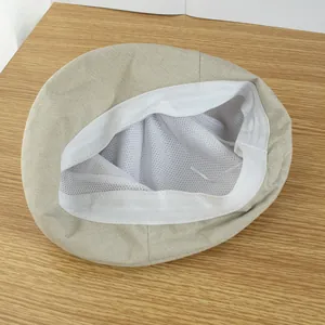 Chapeau de soleil beige avec doublure en maille respirante et cordon de réglage