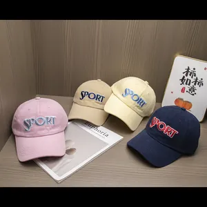 Retro embroidered baseball caps in four colors including pink, beige, and blue