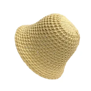 Beige hand-woven crochet bucket hat with hollow-out texture for summer sun protection