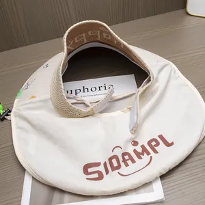 Detail of breathable cream sun hat with neck protection and adjustable Velcro closure