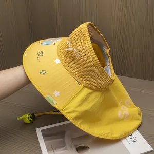 Detail of yellow kids sun hat with breathable mesh and protective neck flap