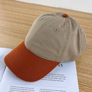 Detail view of contrast baseball cap on a wooden table with soft natural lighting