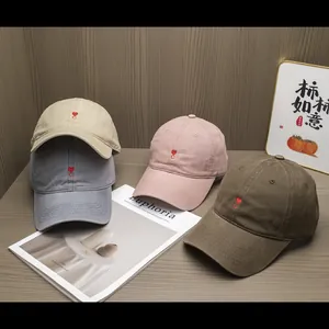 Minimalist cotton baseball caps with C embroidery in beige, grey, pink, and brown