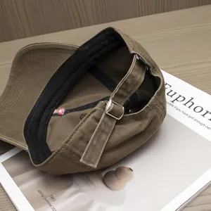 Adjustable brown cotton baseball cap with heart embroidery and a premium metal buckle