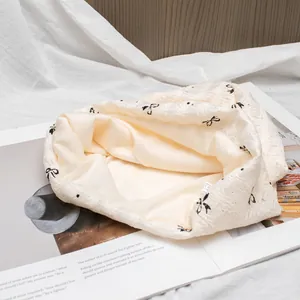 Breathable cotton postpartum beanie for women with black bow print and soft lining