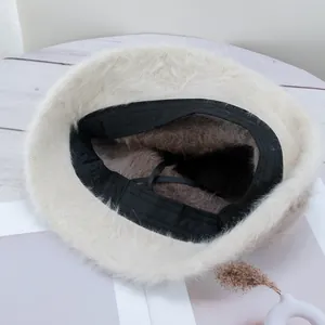 Fuzzy faux fur bucket hat in beige with interior lining and adjustable drawstrings