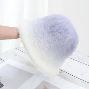 Close-up of the soft gradient purple and white plush faux fur bucket hat fabric