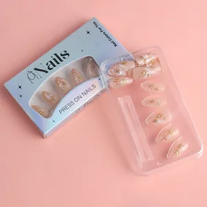 3D gold-stamped almond press-on nails with glitter marble pattern and star accents