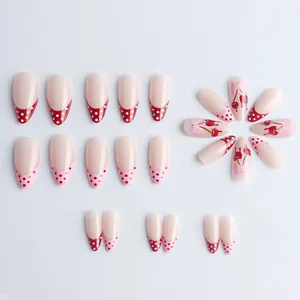 24pcs almond press-on nails with red polka dots, cherry patterns, and pink bows design