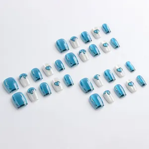 Short square press-on nails set with cat eye blue glitter and 3D heart designs