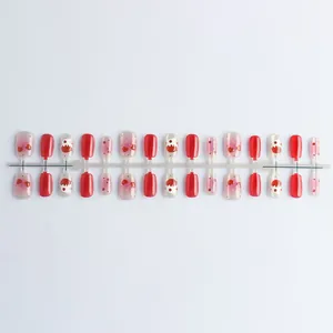 Detail of red heart bow cat eye press-on nails set with gradient blush effect