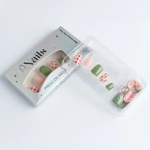 Short square press-on nails set with floral and plaid patterns in 24 pieces packaging