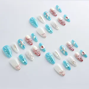 Almond press-on nails with 3D ocean star and seashell relief in blue and white colors