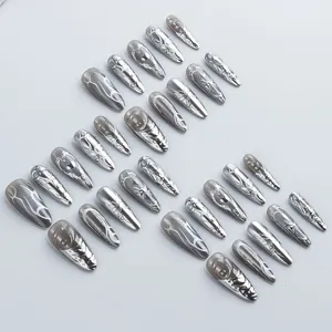 Metallic cat eye stiletto press-on nails with silver liquid metal and flame 3D designs