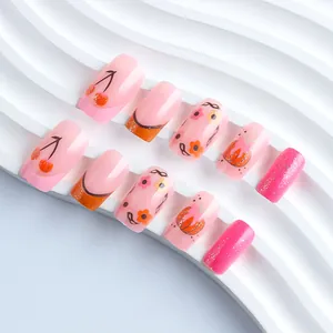 French style floral press-on nails in sweet pink glitter finish with cherry designs