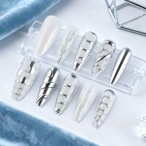 Long pointed silver metallic Y2K press-on nails with 3D liquid texture and honeycomb patterns