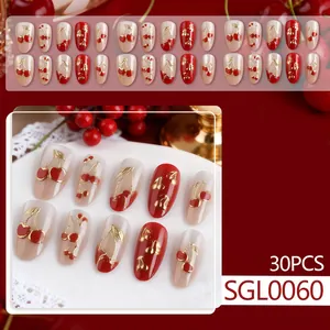 Short oval cat-eye press-on nails set with red cherry designs and 30 pieces