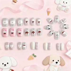 Short square cat eye press-on nails with cute cartoon puppy and 3D bow designs