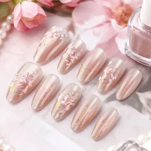 Short almond 3D floral embossed press-on nails with champagne pink pearlescent finish