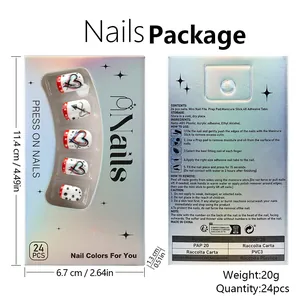 Macro view of 24pcs press-on nails set featuring red heart, arrow and dot graffiti designs