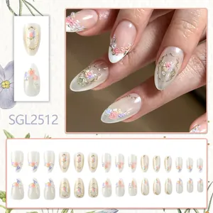 3D floral almond press-on nails with gold relief, pearls, and French floral accents