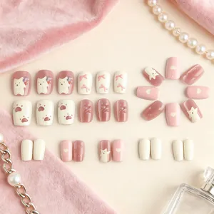 Set de faux ongles roses et blancs avec nœud 3D et dessins de chatons mignons
