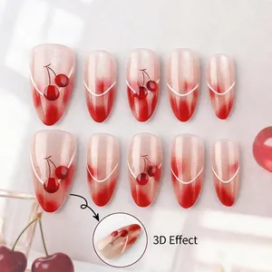 Unghie finte a mandorla con ciliegie 3D, effetto occhio di gatto e sfumatura rossa