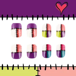 Short glossy Valentine press-on nails featuring colorful patchwork design and stitch patterns