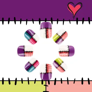 Short glossy press-on nails with colorful patchwork heart designs and stitched patterns
