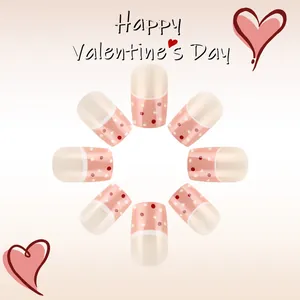Unghie finte lucide di San Valentino con pois e cuori disposti in layout circolare