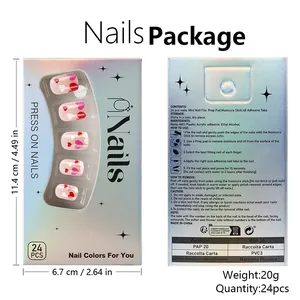 Detail view of pink heart press-on nails packaging with size dimensions and instructions