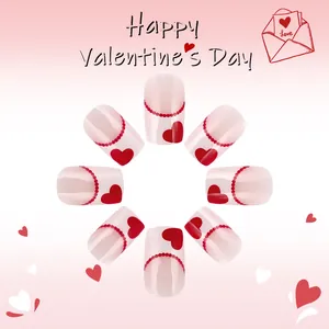 Short square press-on nails with pink gradient, red hearts and French bead design