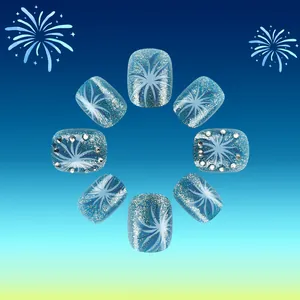 Faux ongles courts ovales festifs avec paillettes bleues motifs feu d artifice