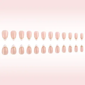 Set of 24 nude pink almond press-on nails with 3D metallic gold stripe accents