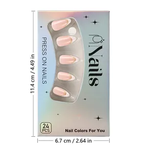 Detail of nude pink press-on nails with 3D gold curved stripes in iridescent packaging