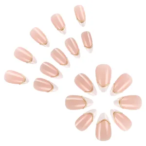French style nude pink press-on nails with 3D gold V-shaped metallic stripes