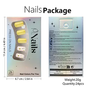 Detail view of the laser silver packaging with yellow daisy press-on nails instruction