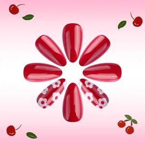 Sweet red almond press-on nails with white flower patterns and cherry accents