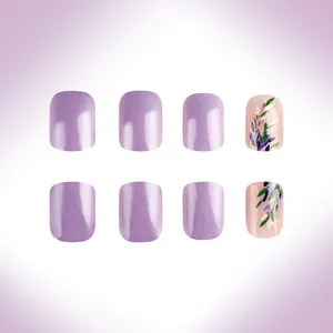 Detail of short square floral press-on nails in glossy lavender and nude pink designs