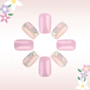 Pink and floral press-on nail kit with flower patterns and polka dots on square tips