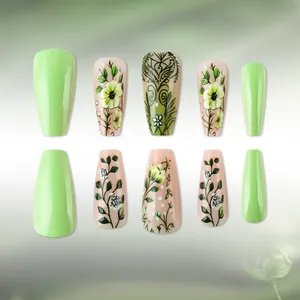 Pastel green floral press-on nails set with blooming patterns and a glossy finish