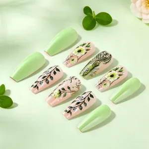 Glossy green floral press-on nails in long coffin shape for spring and summer style