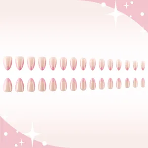 Set of 30 pink French almond press-on nails with glossy finish and nude base
