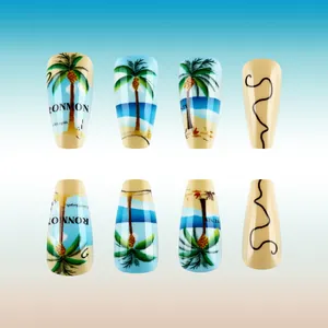 Detail of long coffin press-on nails featuring tropical palm trees and beach landscape